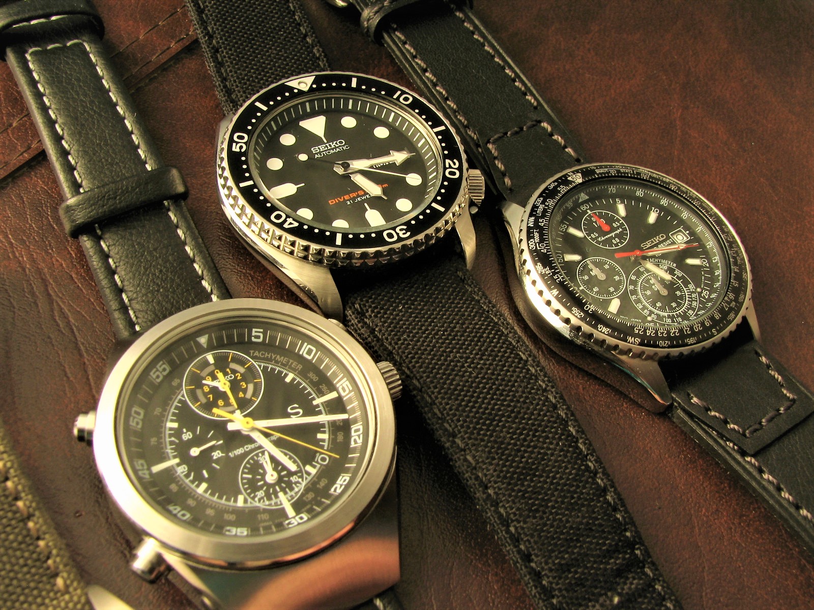 front view of different watches with different types of straps